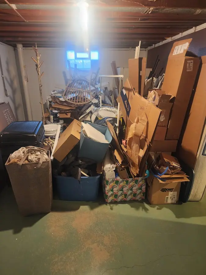 Roll-off dumpster container at job site for Construction Dumpster Rental in Sharon